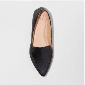 Black pointed flat loafers
